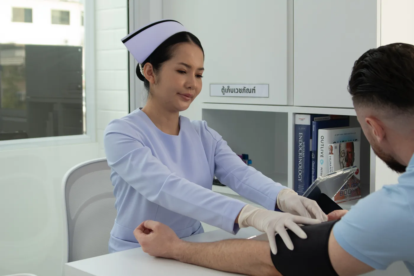 Blood draw by clinical staff at TRT Bangkok Clinic